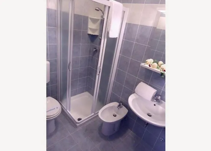 Swimming Pool And Fun In Bibione